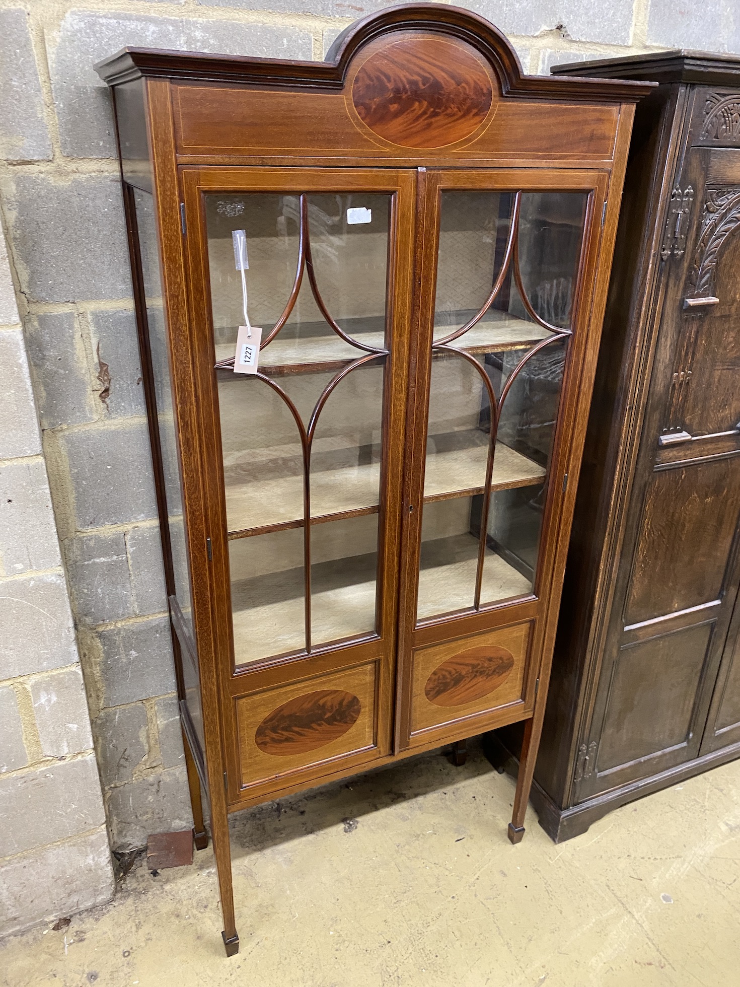 An Edwardian mahogany display cabinet, width 82cm, depth 36cm, height 182cm